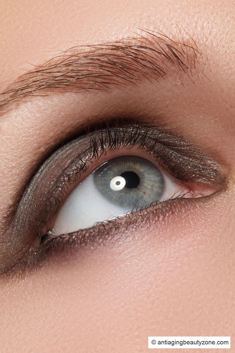 Soft matte fall eyeshadow look with a smokey outer wing for hooded eyes
