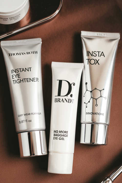 Instant eye tightening creams by Peter Thomas Roth, Dr. Brandt, and Instatox shown side by side on a neutral background.
