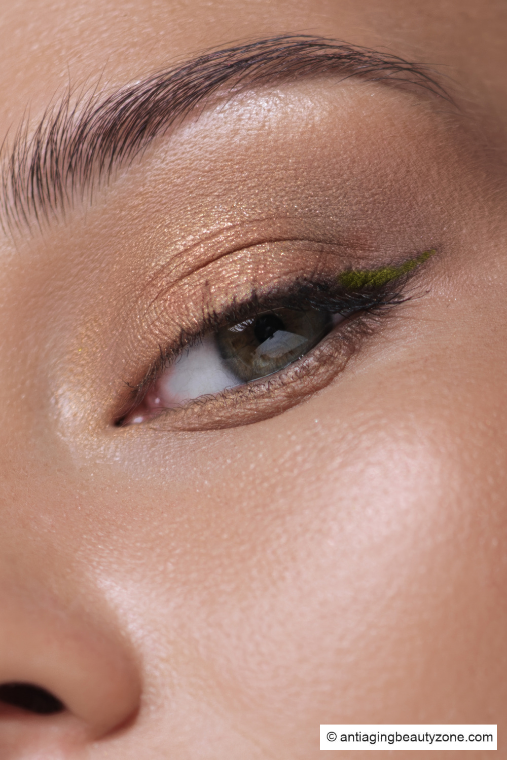Copper shadow and teal flick eyeliner for close-set eyes