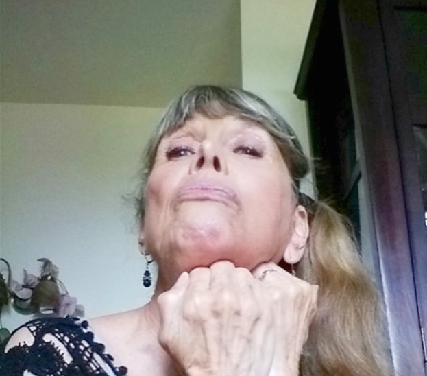 Carolyn from Facial Fitness demonstrates neck firming exercise. Step 2