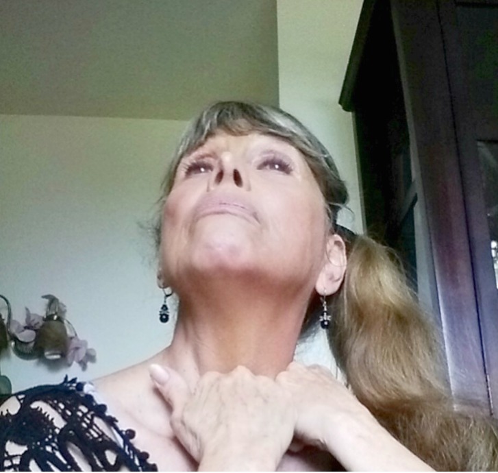 Carolyn from Facial Fitness demonstrates neck firming exercise. Step 3