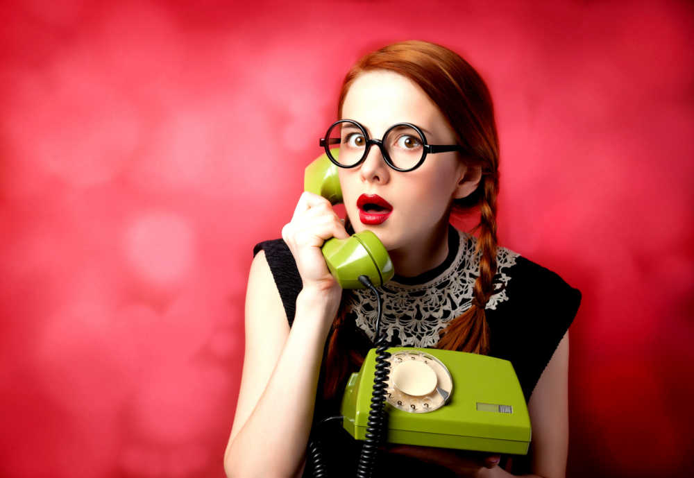 Woman on phone Contact me