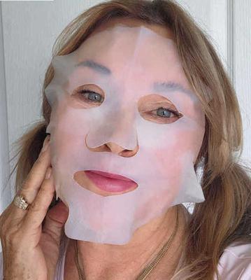 My sheet mask wouldn't fit right! Look at the loose edges around my cheeks and chin.