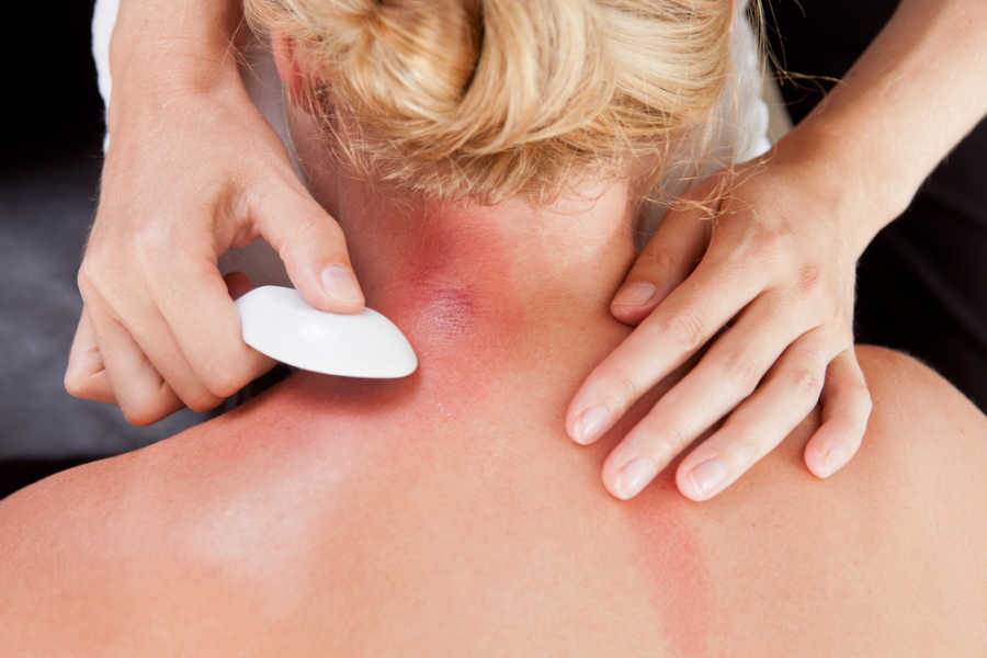 Gua sha neck massage