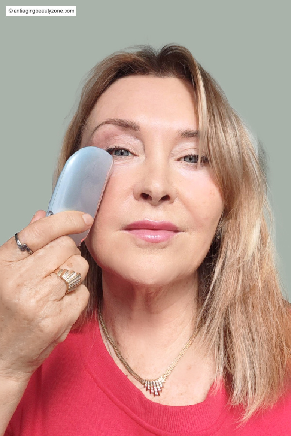gua sha lymphatic drainage sweep under eye to temple for puffy eyes