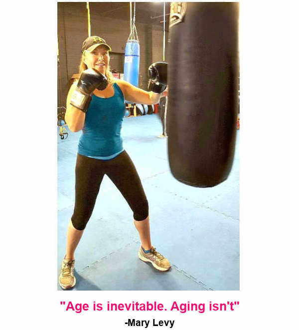 Linda boxing at the gym in her mid-50s, staying active and strong as she gets older