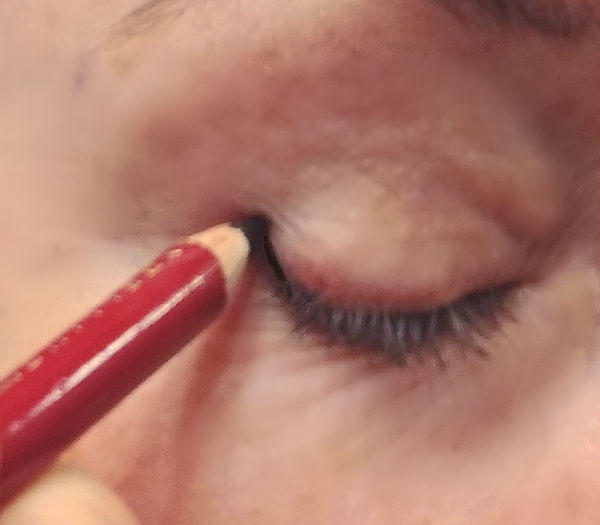 How to apply eyeliner pencil on upper lid. This winged eyeliner is easy and works great for older women. How to apply eyeliner with pictures. How can I make my eyes lift?