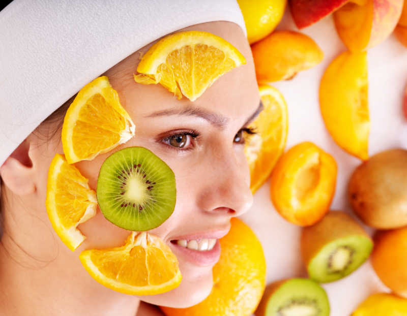 What to do before an enzyme peel. How to prepare. Woman with fruit on her face.