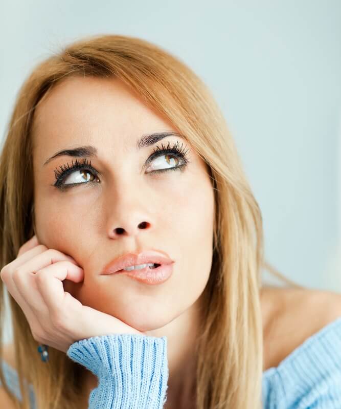 Woman wondering about the benefits of lactic acid peels.