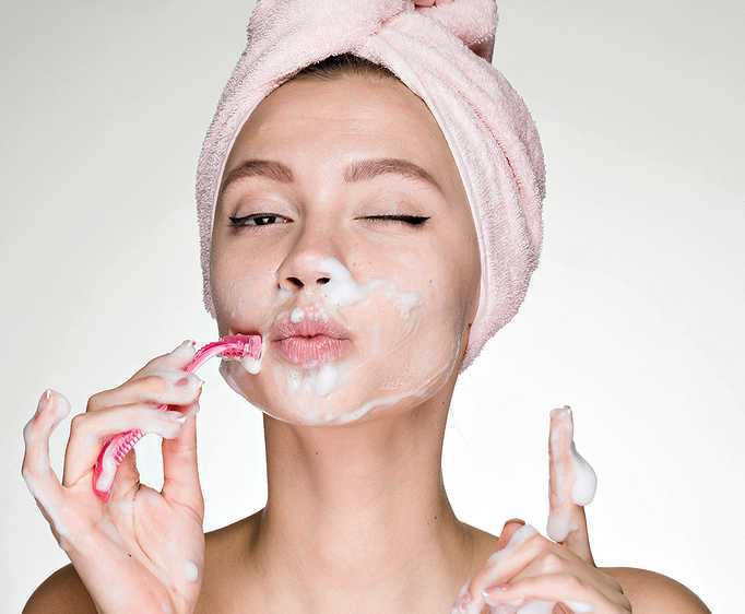 Is Dermaplaning basically shaving? No, dermaplaning does more, it removes dead skin cells and peach fuzz. A woman shaving.Dermaplaning vs shaving? No, it's not quite the same.